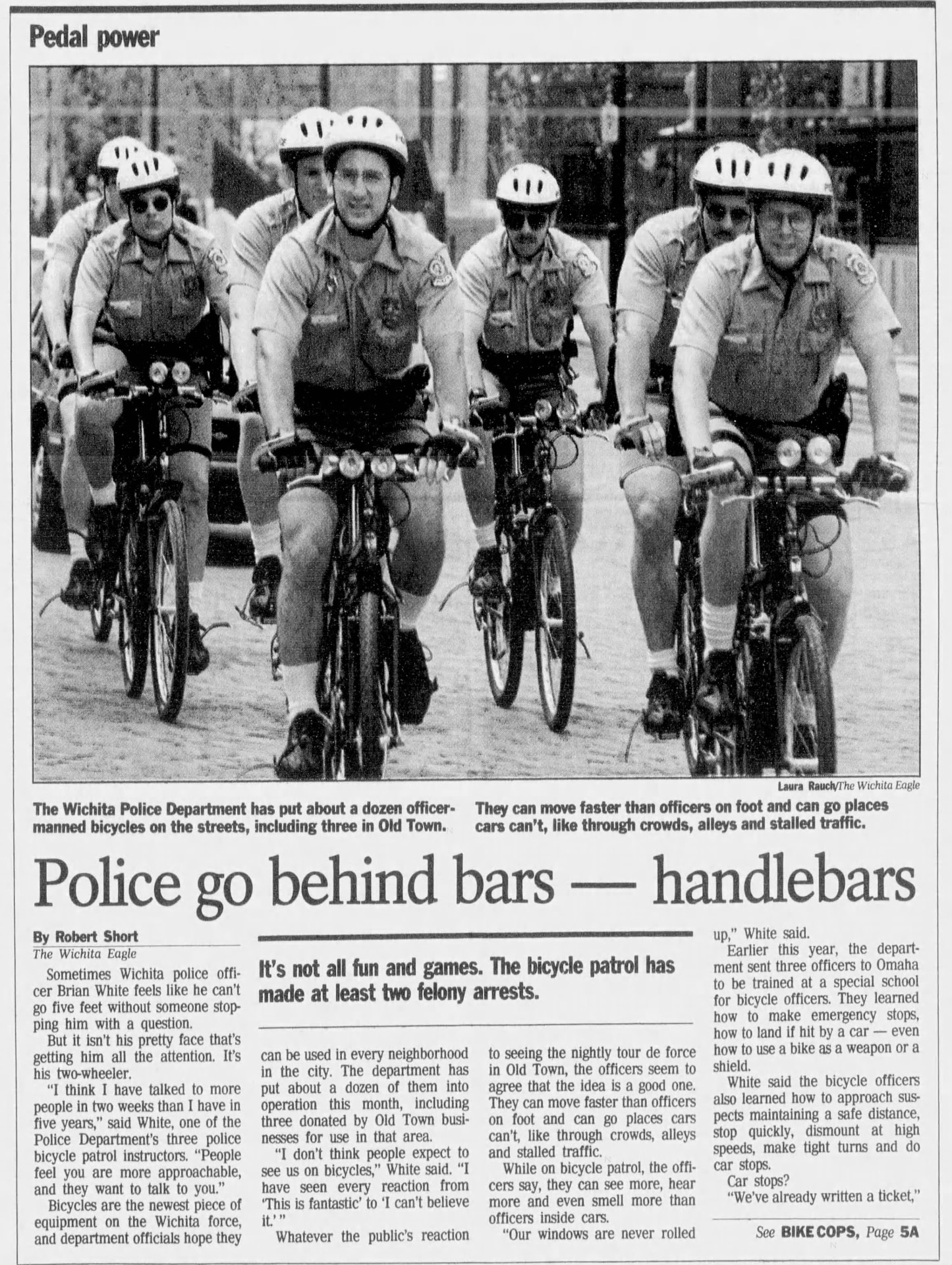 Wichita Eagle front-page feature 'Pedal power: Police go behind bars — handlebars' showing Wichita bicycle patrol officers, May 16, 1994